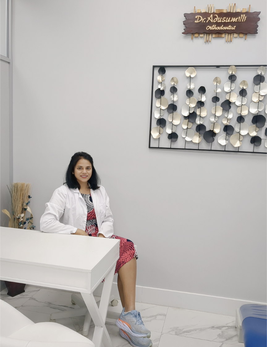 Dr. Prathima Adusumilli seated in office